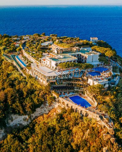 an aerial view of a resort near the ocean at San Montano Resort & Spa in Ischia
