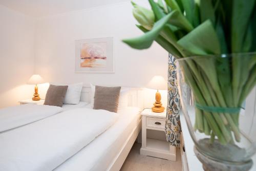 Ένα ή περισσότερα κρεβάτια σε δωμάτιο στο Appartement Wattschnecke