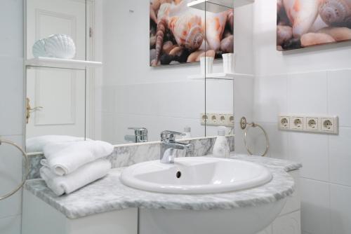 Ένα μπάνιο στο Appartement Wattschnecke