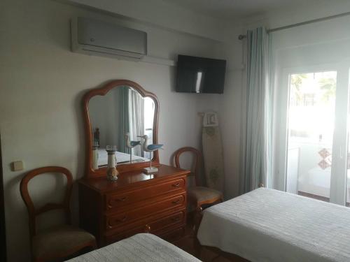 Postel nebo postele na pokoji v ubytování 1 bedroom holidays apartment in Quarteira Algarve