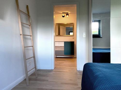 Postel nebo postele na pokoji v ubytování Top Ferienwohnung in Rerik - nahe Salzhaff & Ostsee - mit Gartenterrasse