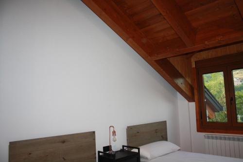 Postel nebo postele na pokoji v ubytování Apartamentos nuevos con encanto Fio de Neu