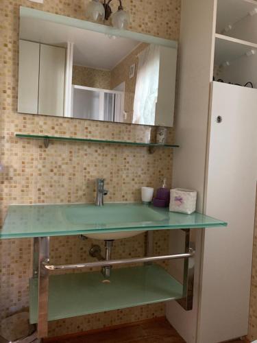 Koupelna v ubytování Appartamento Cottage Lilla a 150 mt dal mare