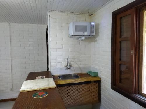 Dapur atau dapur kecil di Hotel Vivenda Penedo