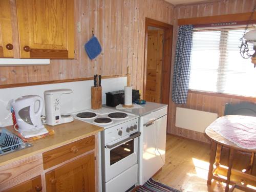 Una cocina o cocineta en Åsgardane Gjestegard