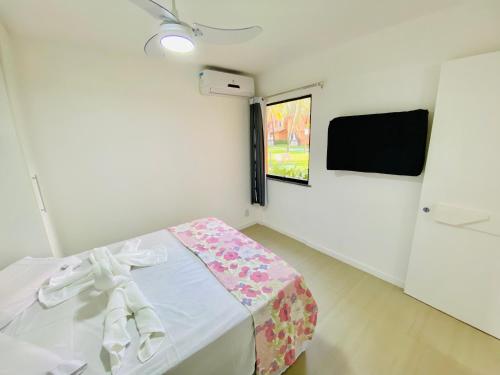 Televisyen dan/atau pusat hiburan di Descanso com pé na areia!