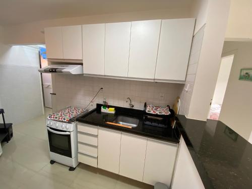 Dapur atau dapur kecil di Descanso com pé na areia!