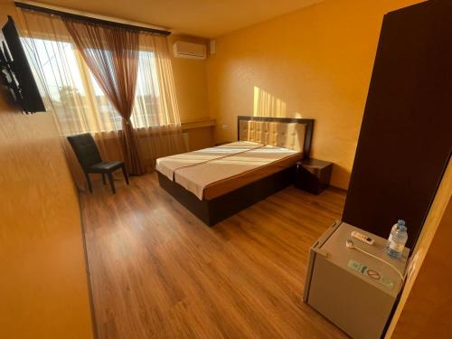 Postel nebo postele na pokoji v ubytování MBM Hotel Yerevan