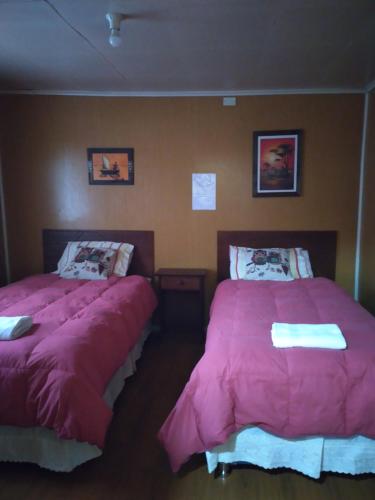 Cama o camas de una habitación en hostal geminis ,phillipi 653 centro
