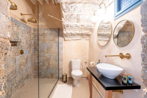 Kylpyhuone majoituspaikassa Arabesque House