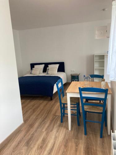 Ένα ή περισσότερα κρεβάτια σε δωμάτιο στο Appart’hôtel saint patrice