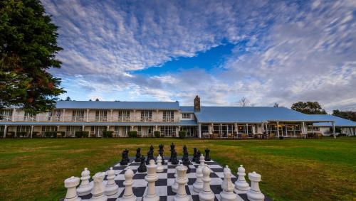 a large chess board in front of a building at VR Rotorua Lake Resort in Rotorua