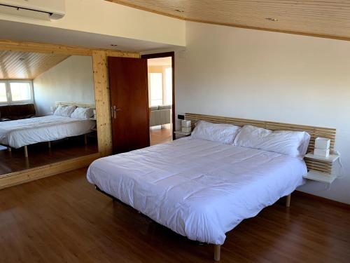 Giường trong phòng chung tại Apartamento entero con vistas panorámicas