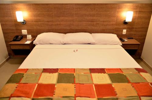 Katil atau katil-katil dalam bilik di Hotel Matão By Mercure