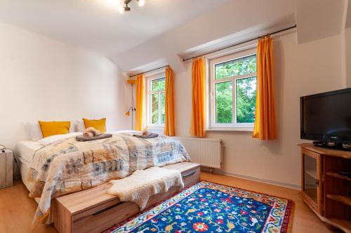 Ένα ή περισσότερα κρεβάτια σε δωμάτιο στο Gästehaus Harzluft / Gruppenferienhaus