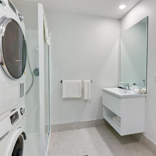 Un baño de Quest Takapuna