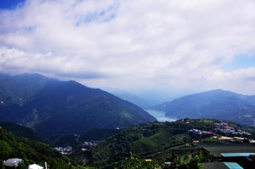 a view of a valley of mountains with a lake at Emmanuel Farm House in Renai