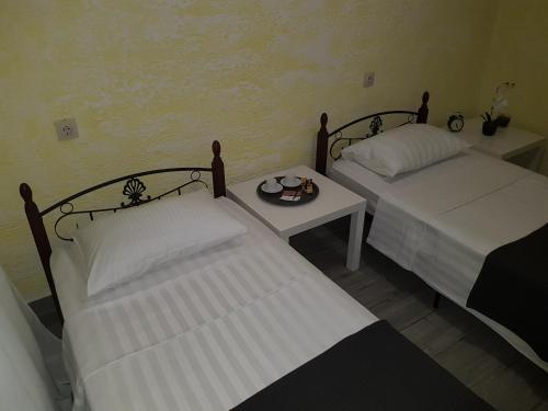 Кровать или кровати в номере DMEcity
