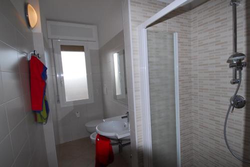 Et badeværelse på Residence Condominio ROMA