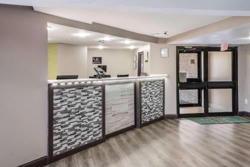 a lobby with a counter in a building at Quality Inn Greer - Greenville in Greer