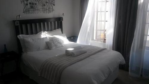 Katil atau katil-katil dalam bilik di Hiflyerz Guest House