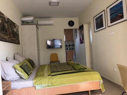 En eller flere senger på et rom på Panoráma Villa