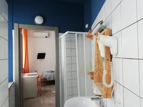 Kylpyhuone majoituspaikassa La Cordata Accommodation - Hotel Woodhouse