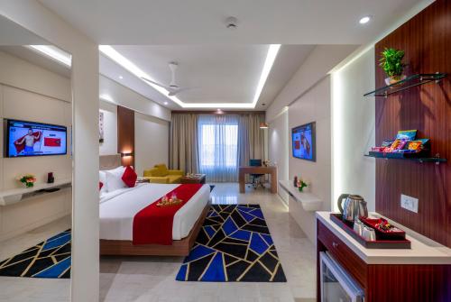 Ένα ή περισσότερα κρεβάτια σε δωμάτιο στο Lords Eco Inn Shapar Rajkot