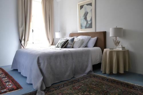 Postel nebo postele na pokoji v ubytování La Villa Escuris