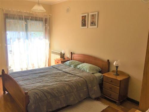 Llit o llits en una habitació de Alojamento Rocha
