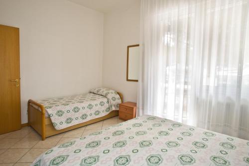Ένα ή περισσότερα κρεβάτια σε δωμάτιο στο Villa Hanna
