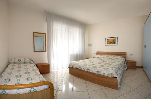 Ένα ή περισσότερα κρεβάτια σε δωμάτιο στο Villa Hanna