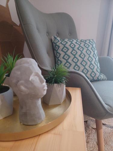 Un lugar para sentarse en Sroom Apartment