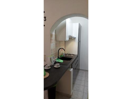 Kuchyň nebo kuchyňský kout v ubytování Blue Sea Vir Apartments