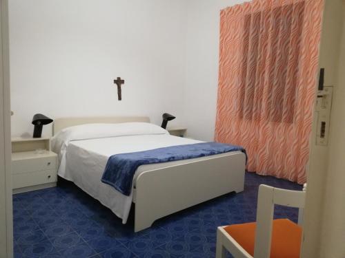 Een bed of bedden in een kamer bij Casa Sgarlata