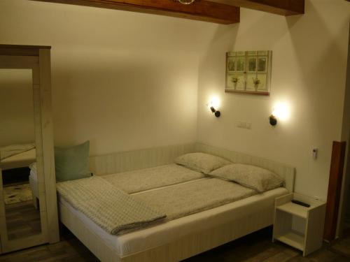 Posteľ alebo postele v izbe v ubytovaní CASA DE OASPETI LIVIU