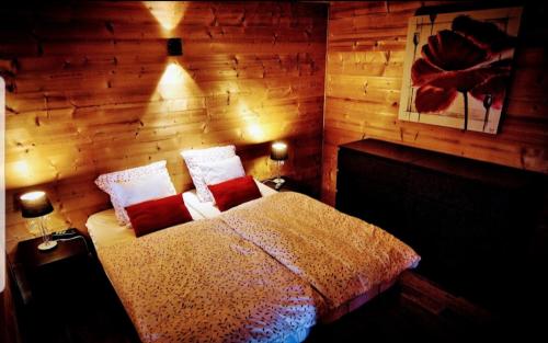 Postel nebo postele na pokoji v ubytování Gîte aux Deux Chênes