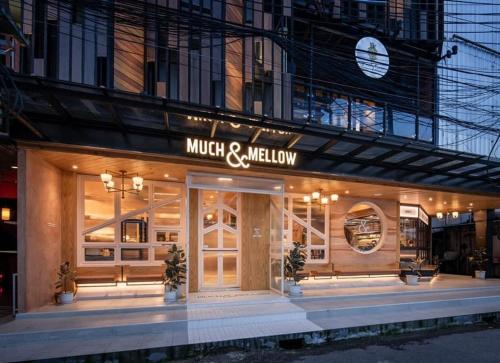 a music and melbourne store front at night at Family Tree Hotel in Krabi town