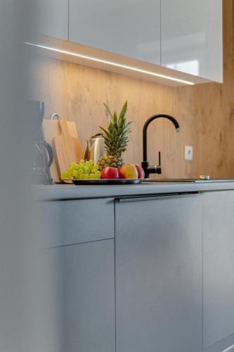 Η κουζίνα ή μικρή κουζίνα στο Apartamenty Kozubnik - Apartament 16 z dużym tarasem