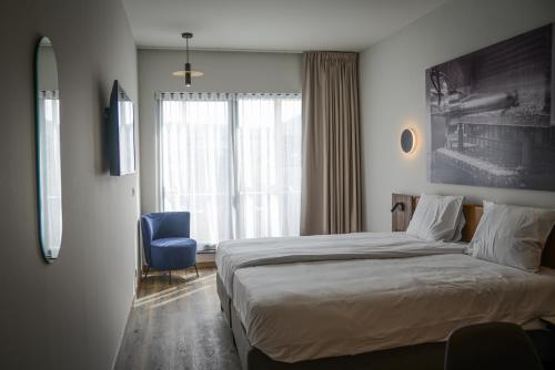 Cama o camas de una habitación en Pegard Andenne Centre