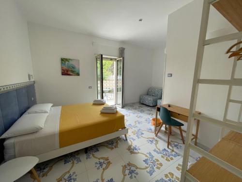 Postel nebo postele na pokoji v ubytování Acquadamare B&B