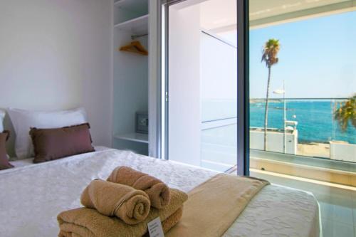 Ένα ή περισσότερα κρεβάτια σε δωμάτιο στο Phaedrus Living: Seaview Emerald Flat Lighthouse 48