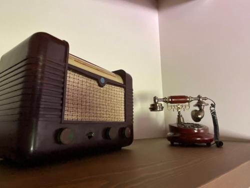 a tv and a small toy engine sitting on a table at Casa La Pedrana in Chía