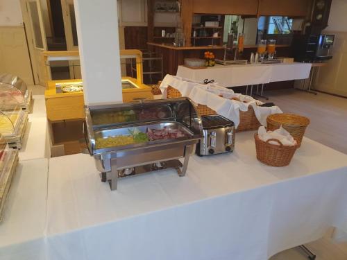 a food cart sitting on top of a counter at Hasli Lodge in Meiringen