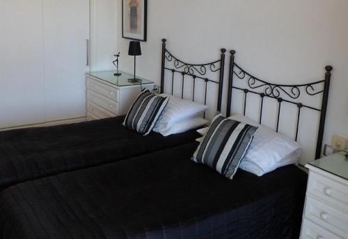 Ένα ή περισσότερα κρεβάτια σε δωμάτιο στο Luxury Apartment in Los Boliches