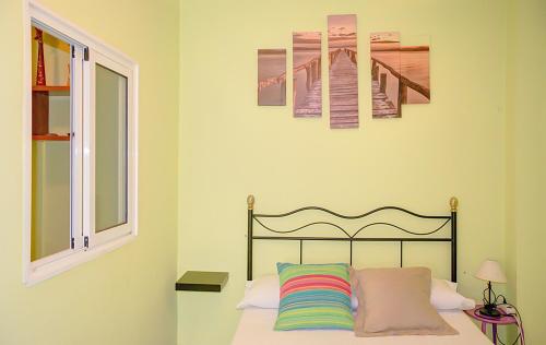 Cama o camas de una habitación en Apartamento en Triana con encanto