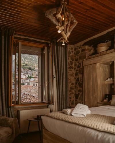 Ένα ή περισσότερα κρεβάτια σε δωμάτιο στο Afanos Guesthouse 