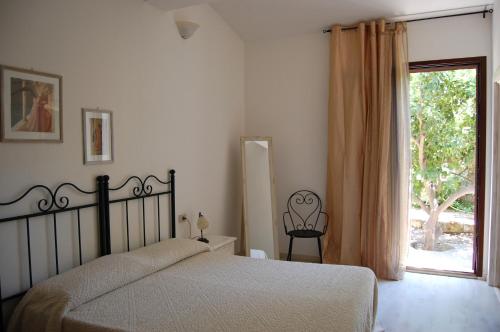 A bed or beds in a room at Andrea E Valentina