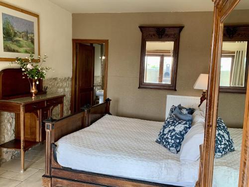 Ένα ή περισσότερα κρεβάτια σε δωμάτιο στο Holiday home Haras du Ry
