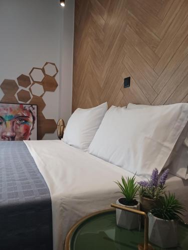 Postel nebo postele na pokoji v ubytování Sroom Apartment